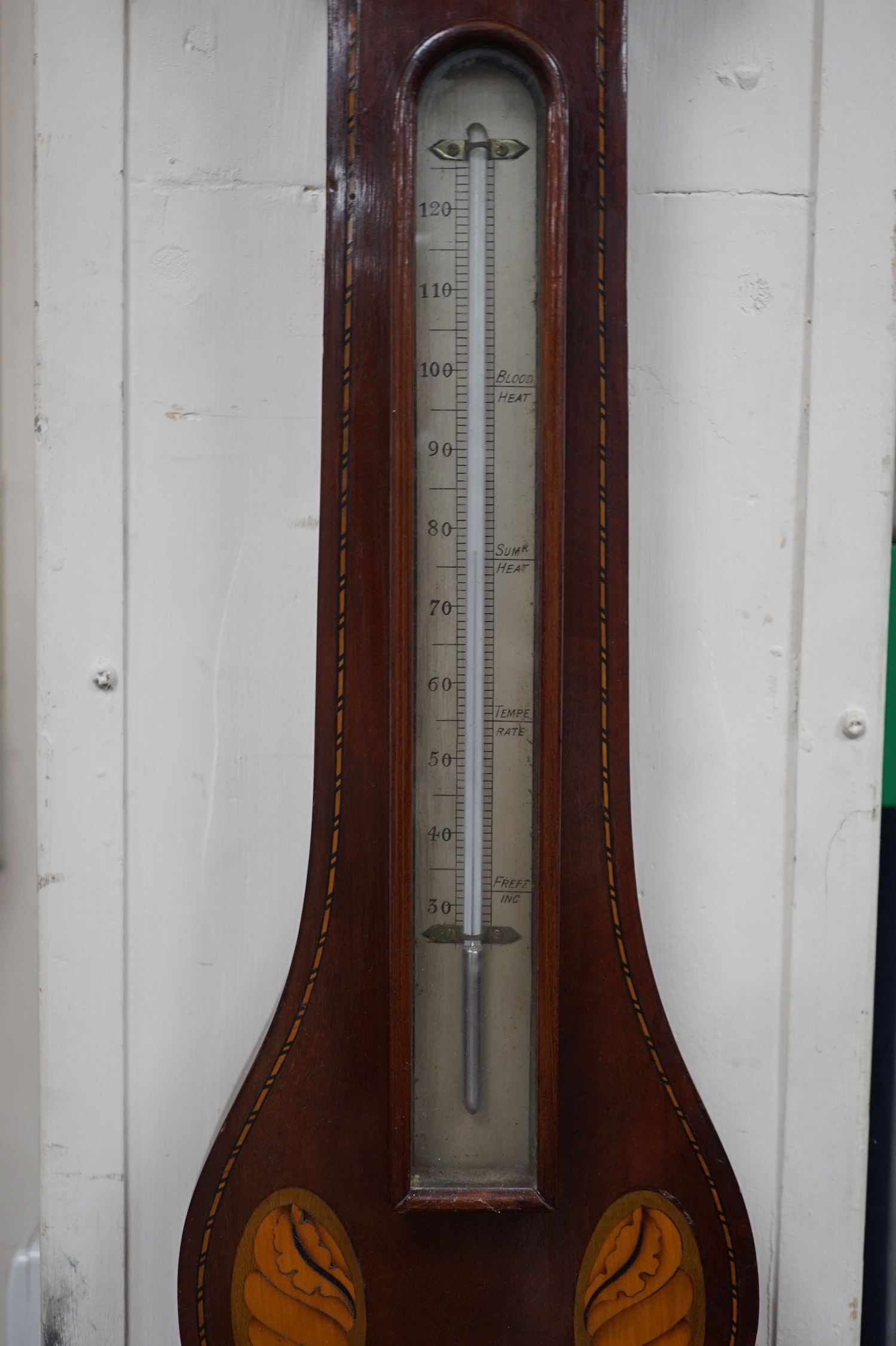 An Edwardian George III style inlaid mahogany barometer, 100cm high